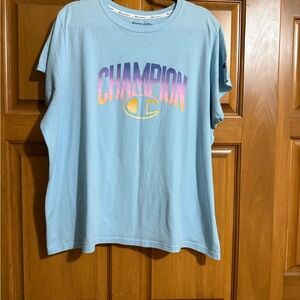 Champion Light Blue Crewneck Tee with Black Logo Print. PTP 27.